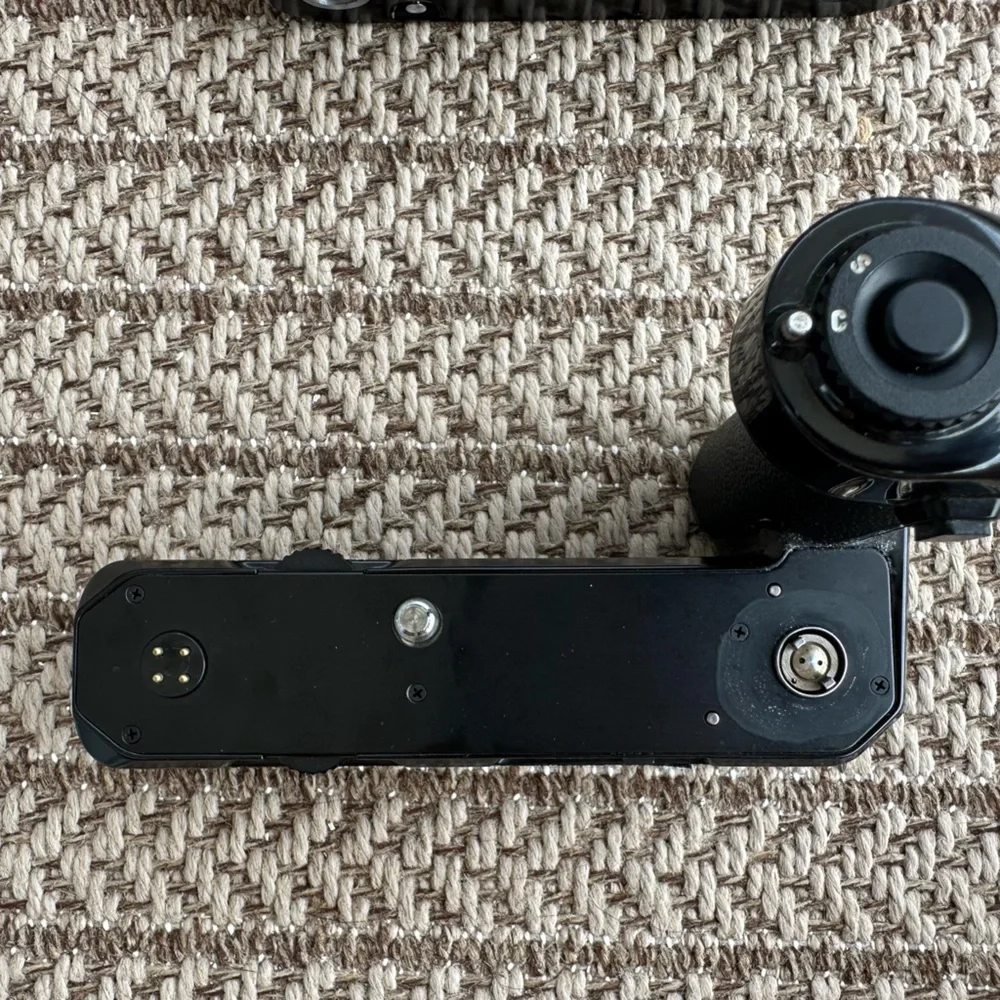 Nikon FE film camera with MD12 attachment grip